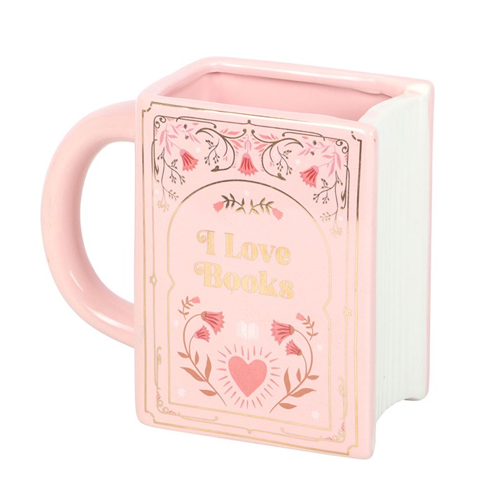 Pink book shaped ceramic mug with gold lettering “I Love Books” on white background.