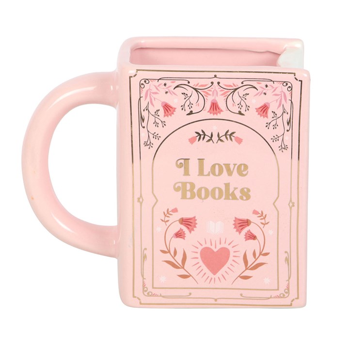 Front view of pink ceramic book mug with floral details and “I Love Books” design.