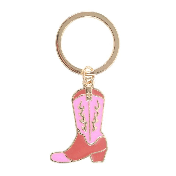Close-up of pink enamel cowboy boot keyring charm.