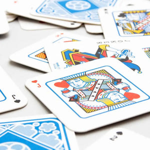 Close-up of picture cards from Playing Card Drink Mats.