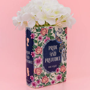 Jane Austen-inspired Pride and Prejudice Large Book Vase filled with white flowers, adding a romantic touch to any space.