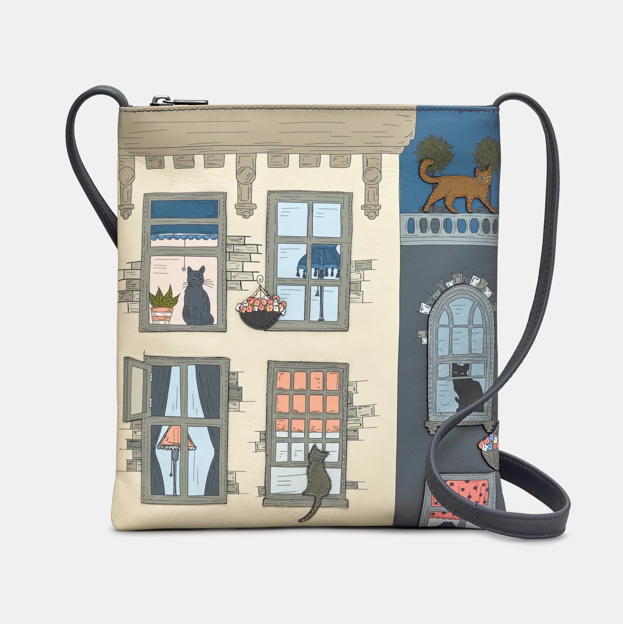 Front view of Purrfect Neighbours Leather Cross Body Bag by Yoshi featuring cat appliqué design on townhouse windows.