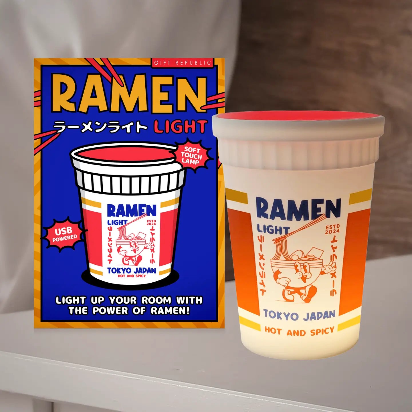 Ramen Light next to its colourful box packaging with bold Japanese-style graphics.