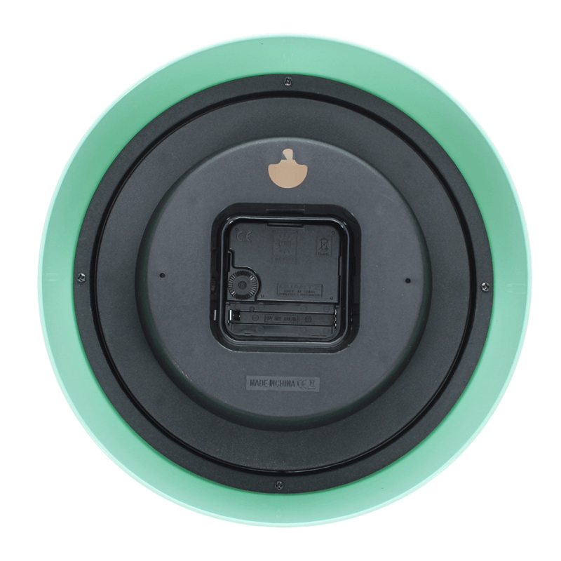 Mint-green retro wall clock back view showing battery compartment