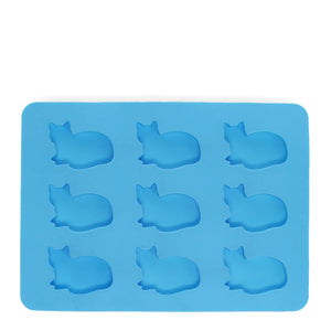 Top view of empty blue silicone tray showing nine cat moulds.