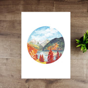 Rocky Mountains in fall art print with lake, forest and snow-capped peaks.