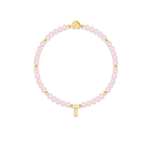 Close-up of Rose Quartz Gold Beaded Bracelet – Delicate rose quartz and gold bead bracelet with a heart charm, ideal for gifting.