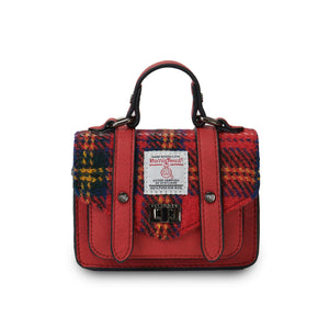 Islander Harris Tweed Wee Satchel with a Red and Green Tartan design and a black PU leather Body.