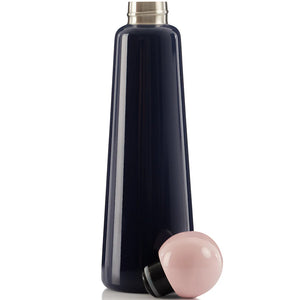 Skittle Bottle Indigo & Pink with lid removed, stainless steel opening visible beside glossy pastel pink spherical cap.