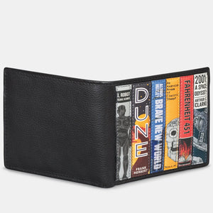 Close-up of science fiction book applique on black leather wallet featuring Dune and Brave New World.