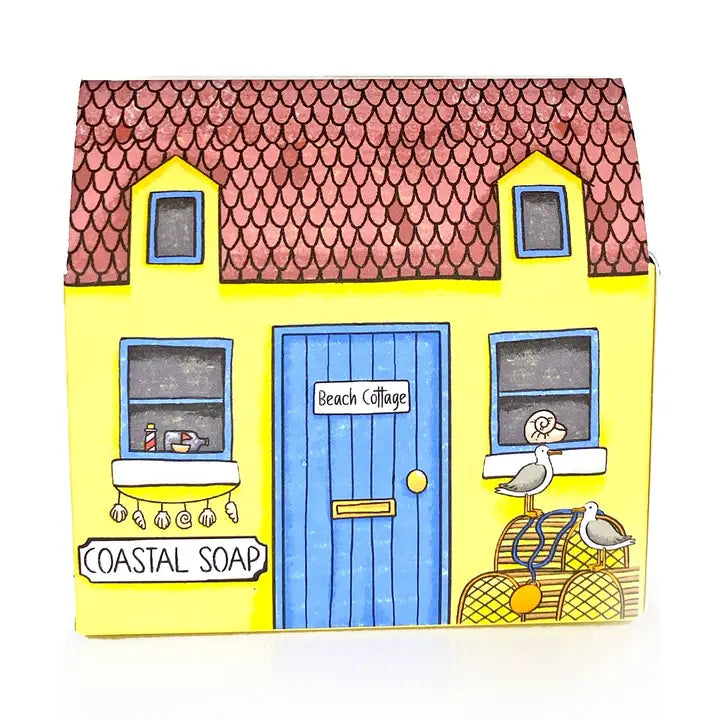 Seaside house soap front view showing illustrated cottage on white background