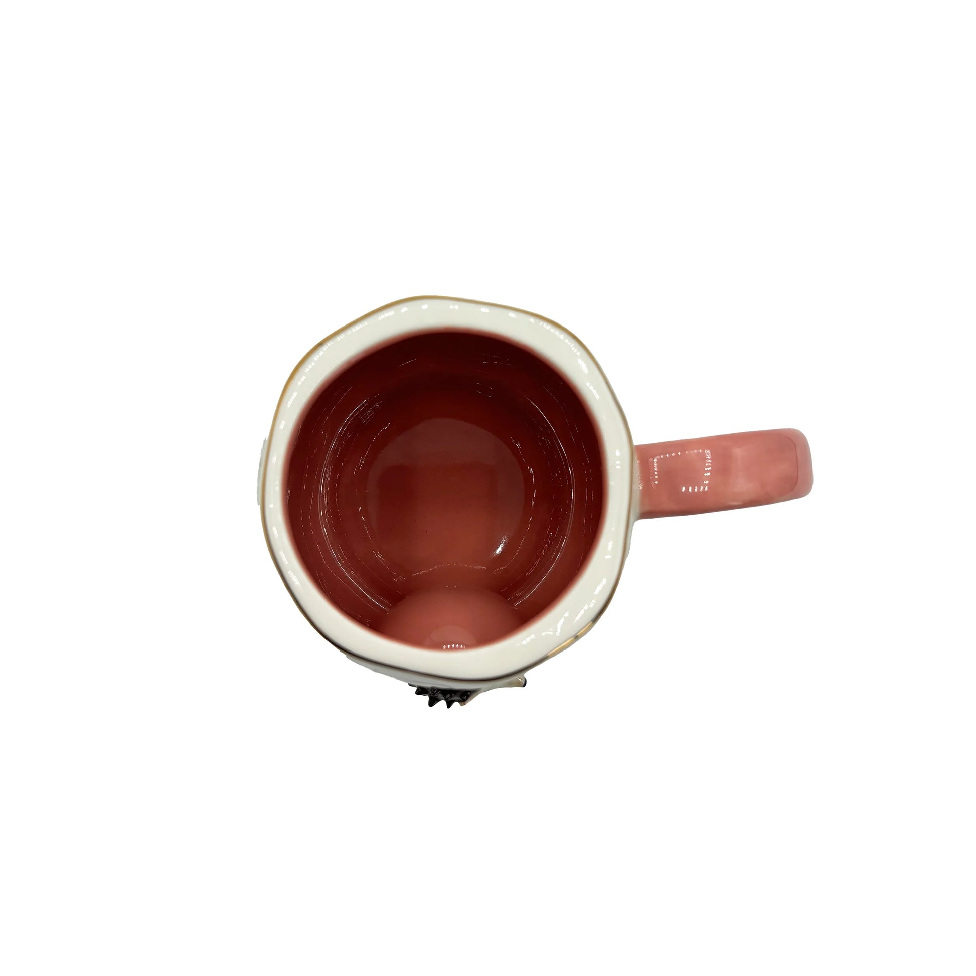 Top view of Secret Garden Hedgehog Mug showing pink glazed interior.