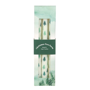 Boxed set of 3 Christmas tree printed taper candles with green and white packaging.