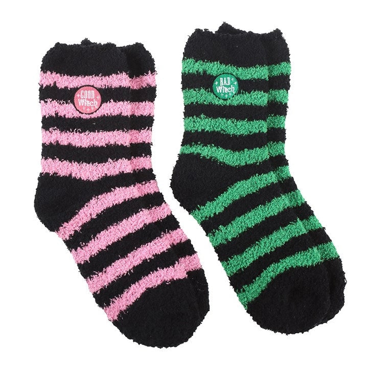 Cosy striped Good Witch and Bad Witch socks – pink and green fluffy pairs.