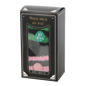 Gift box containing two pairs of witch-themed striped fluffy socks – Good Witch Bad Witch set packaging.