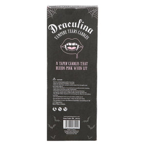 Back of Draculina Vampire Tears candle box showing gothic design and safety instructions with vampire lips illustration.
