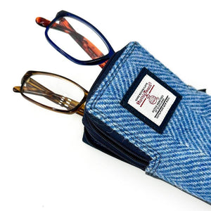 Front view of sky blue Harris Tweed double glasses case with glasses inside.