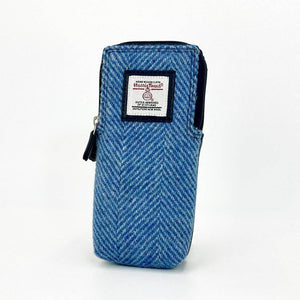 Angled front view of double glasses sleeve in blue herringbone tweed.
