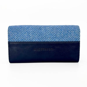 Back of sky blue Harris Tweed purse in faux leather with Maccessori branding.