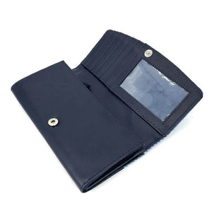 Open Harris Tweed envelope purse showing card slots, clear ID window, and snap closure.