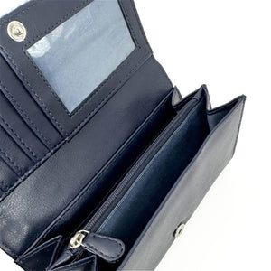 Inside view of sky blue Harris Tweed purse showing zipped coin section and spacious note compartments.