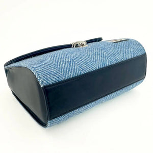 Bottom of Sky Blue Mini Day Bag with Harris Tweed body and navy vegan leather base.