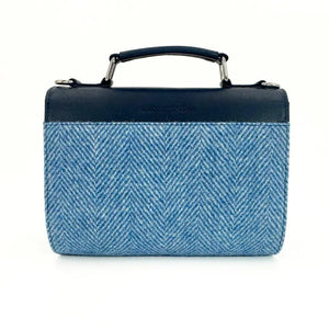 Rear view of Harris Tweed Mini Day Bag with curved navy top handle and blue herringbone tweed.