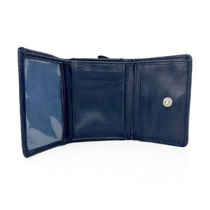 Inside of Harris Tweed trifold purse showing open coin compartment, card slots, and note pocket.