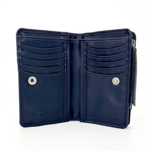 Interior of Harris Tweed Zip Purse displaying 11 card slots and note compartments in navy faux leather.