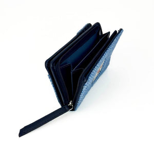 Top-down view of open zip section in Sky Blue Harris Tweed Purse showing spacious coin compartment.