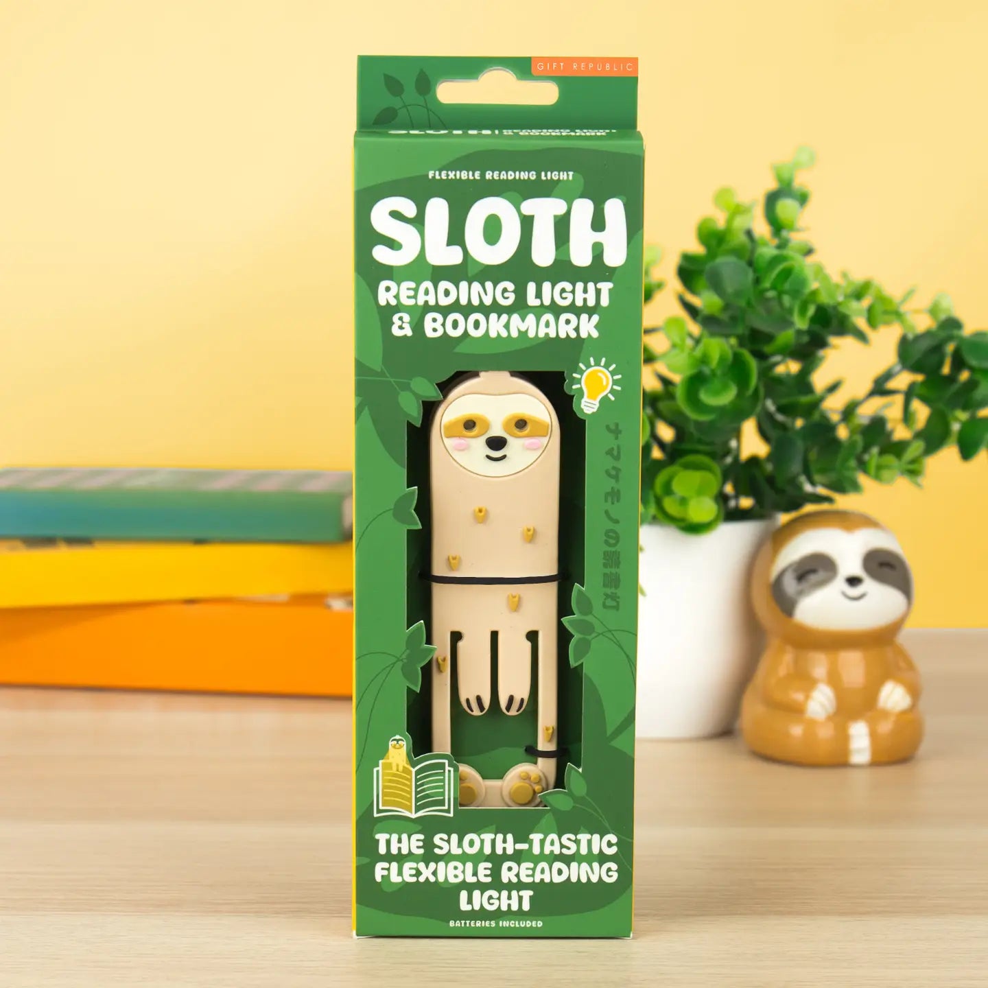 Front view of Sloth Reading Light & Bookmark in packaging – cute sloth design with green box and bold lettering.