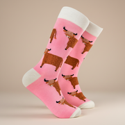 Fluffy Wee Hairy Coo Socks in dusky pink on beige background