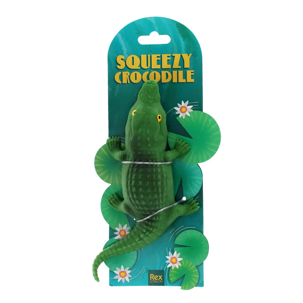 Squishy Toy Crocodile in packaging with lily pad design – tactile sensory stress toy for kids and adults.