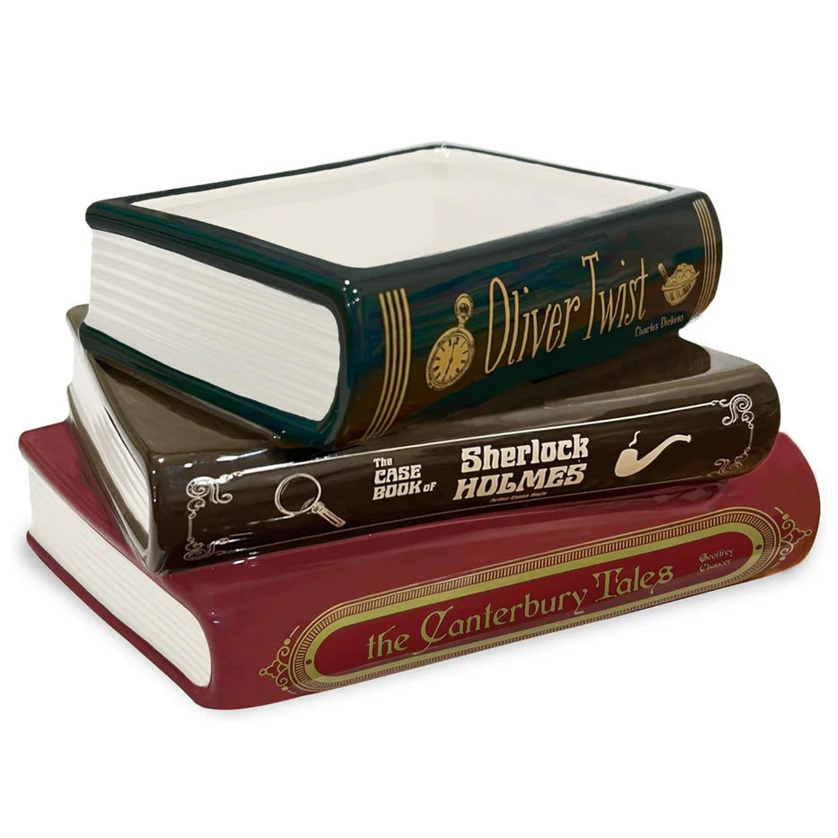Close-up of ceramic book planter with glossy finish and classic literary spine designs.