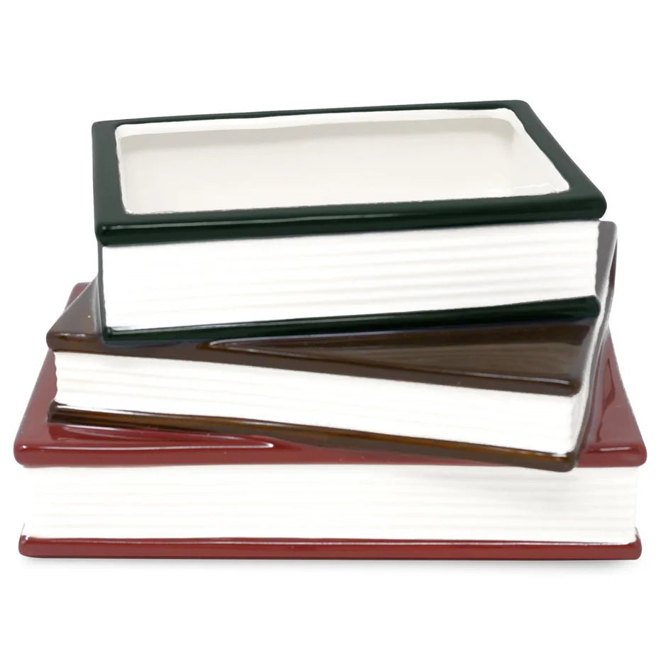 Top view of stacked book planter showing the open compartment for plants or storage.