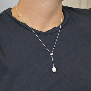 Model wearing Sterling Silver Crystal & Pearl Drop Necklace with fine silver chain.