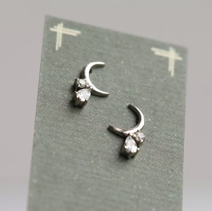 Delicate Silver Moon Earrings Displayed on a Jewellery Card.