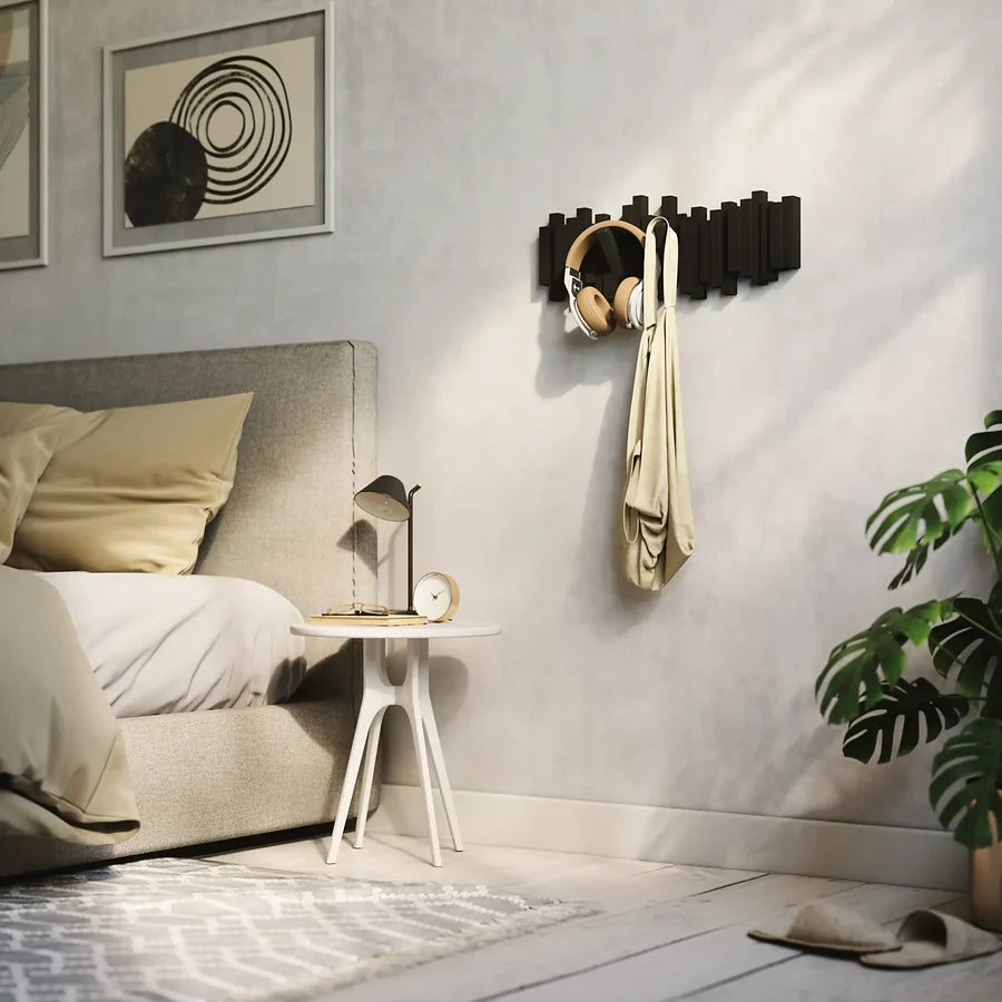 Umbra Sticks hook black in bedroom with jacket hanging lifestyle setting
