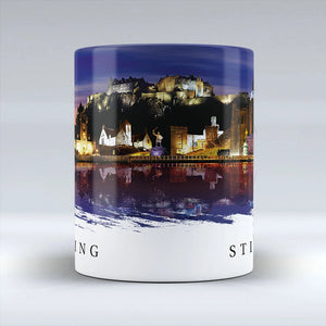 Panoramic wrap-around design of the Stirling Night Mug showcasing the city’s landmarks at night.