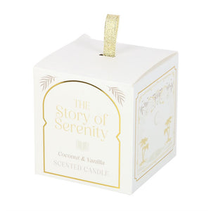 Elegant gift box for The Story of Serenity Coconut & Vanilla Candle, white with gold accents and illustrated side panels.