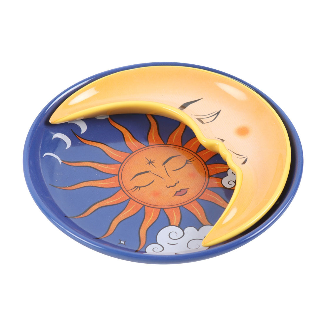 Side angle of celestial trinket dish showing yellow crescent moon nested over a radiant sun face on a deep blue round ceramic base.