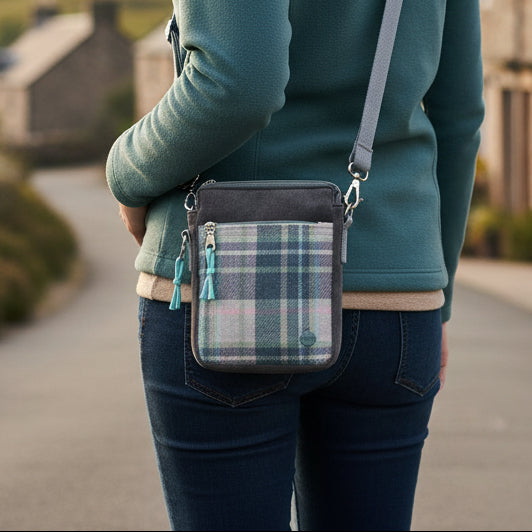 Skye Tweed Phone Crossbody Pouch in blue plaid worn crossbody style