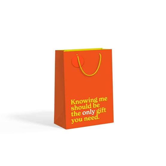 Orange medium gift bag with yellow text on white background