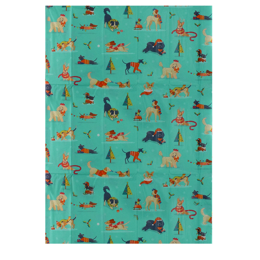 Unfolded Festive Friends tissue paper showing colourful dog and Christmas tree pattern – ideal for wrapping or crafts.