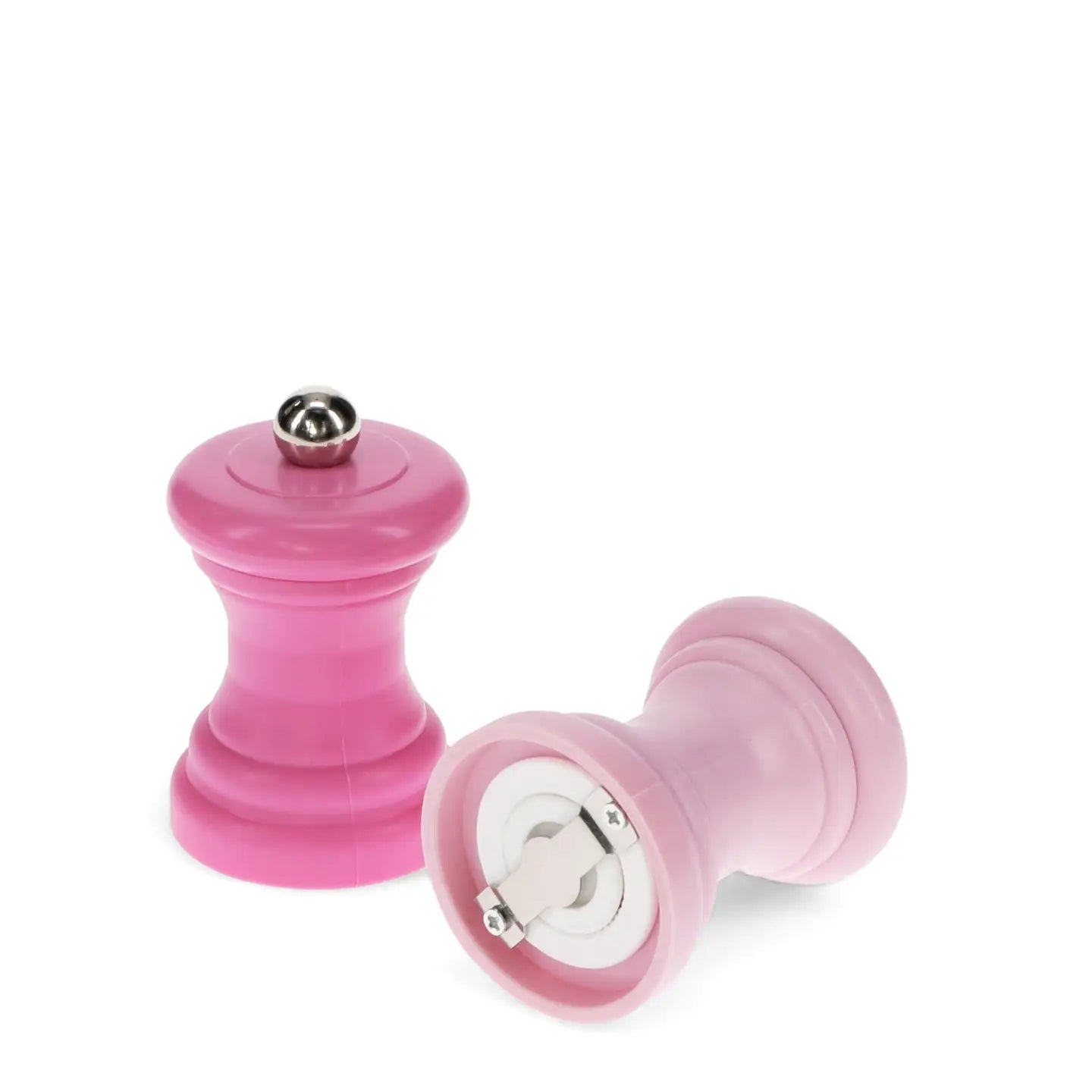 Two-tone pink mini salt and pepper grinders with ceramic grinding mechanism shown underneath.