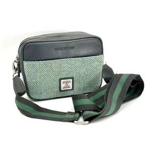 Turquoise Herringbone: Harris Tweed Camera Bag in classic Turquoise Herringbone with Grey vegan leather trim. With a removeable grey and green strap.