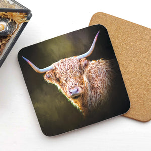 A Twilight Highland Cow Coaster featuring a beautifully detailed illustration of a Highland cow with large curved horns, set against a rustic background. The coaster has a cork base and a matte laminate finish for protection.