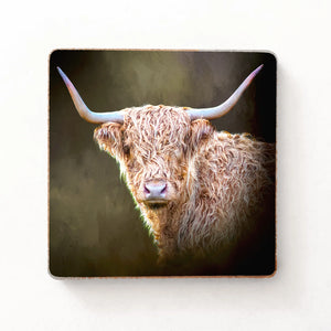 A Twilight Highland Cow Fridge Magnet placed on a white background, showcasing the detailed artwork and rustic charm.