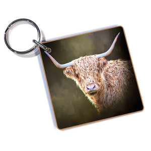 Twilight Highland Cow Keyring featuring a detailed digital artwork of a shaggy Highland cow with curved horns, attached to a silver split ring.