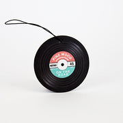 Vinyl record-shaped pinewood-scented car air freshener on white background – retro design, perfect gift for music lovers.